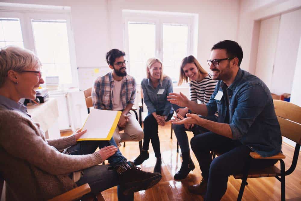 Group of Students engaging inperson coaching classes with mentor